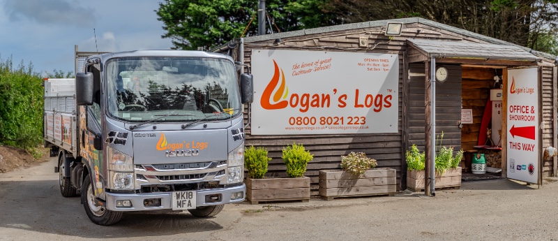 logan's logs lorry with kiln dried firewood logs outside the log sales office