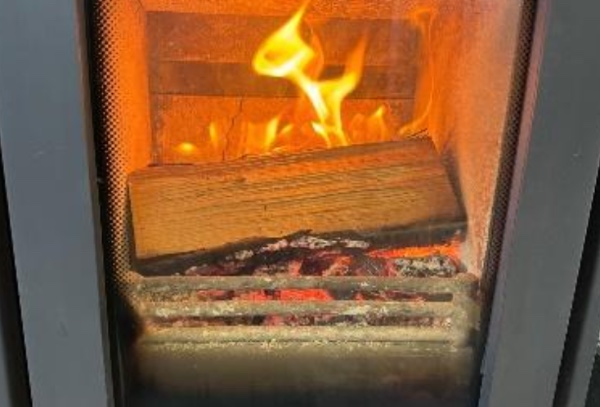 alder log burning on the fire