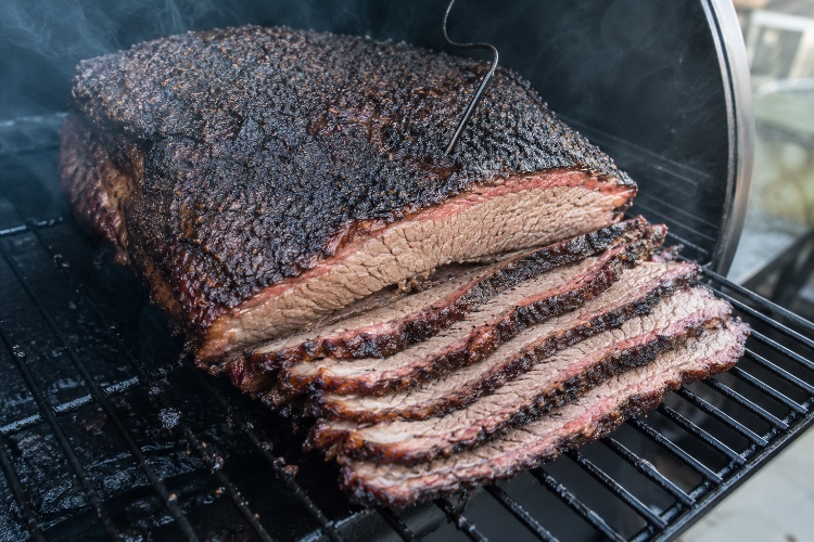 smoked brisket with rich bark from a long stall